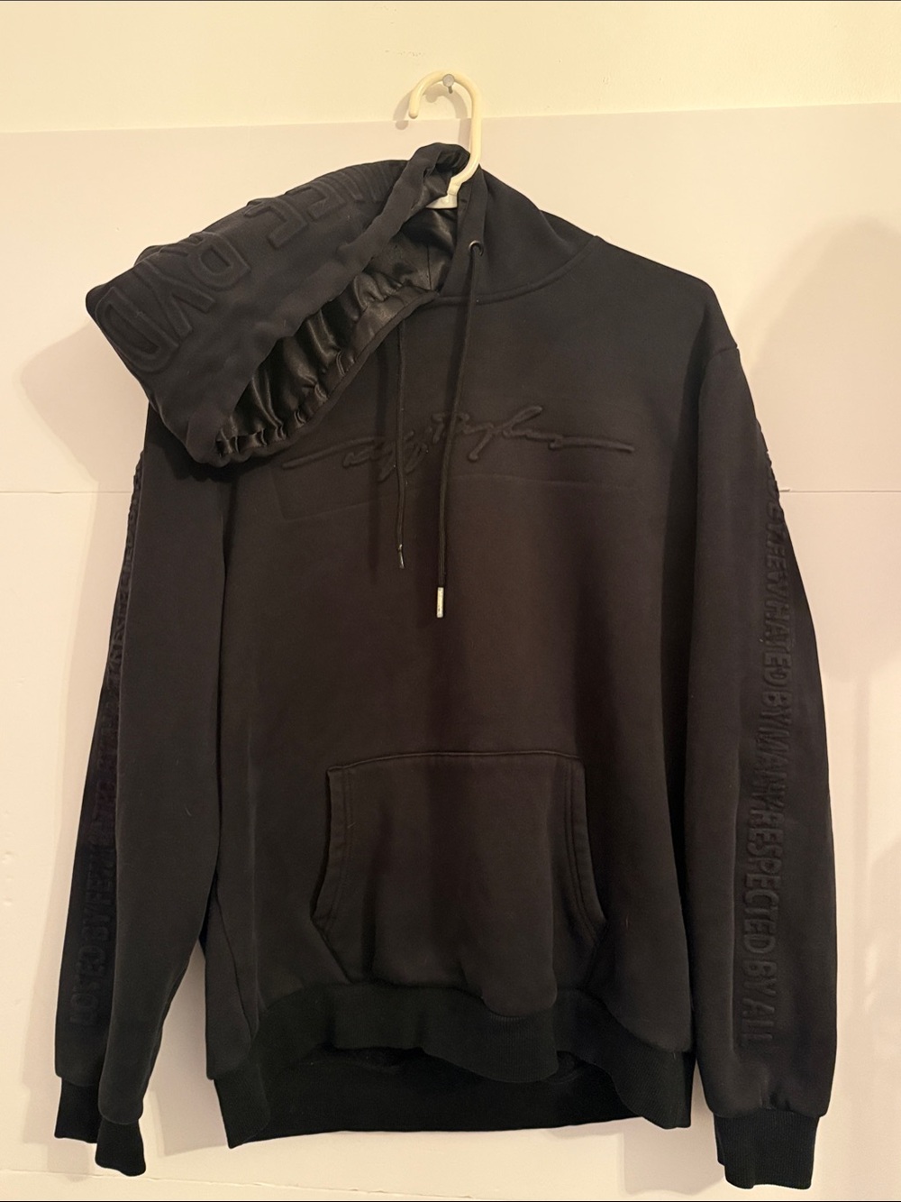 RUFF RYDERS Embroidered Black Hoodie with Embossed Script on both sleeves.